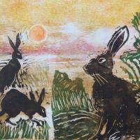 woodcut print of hares